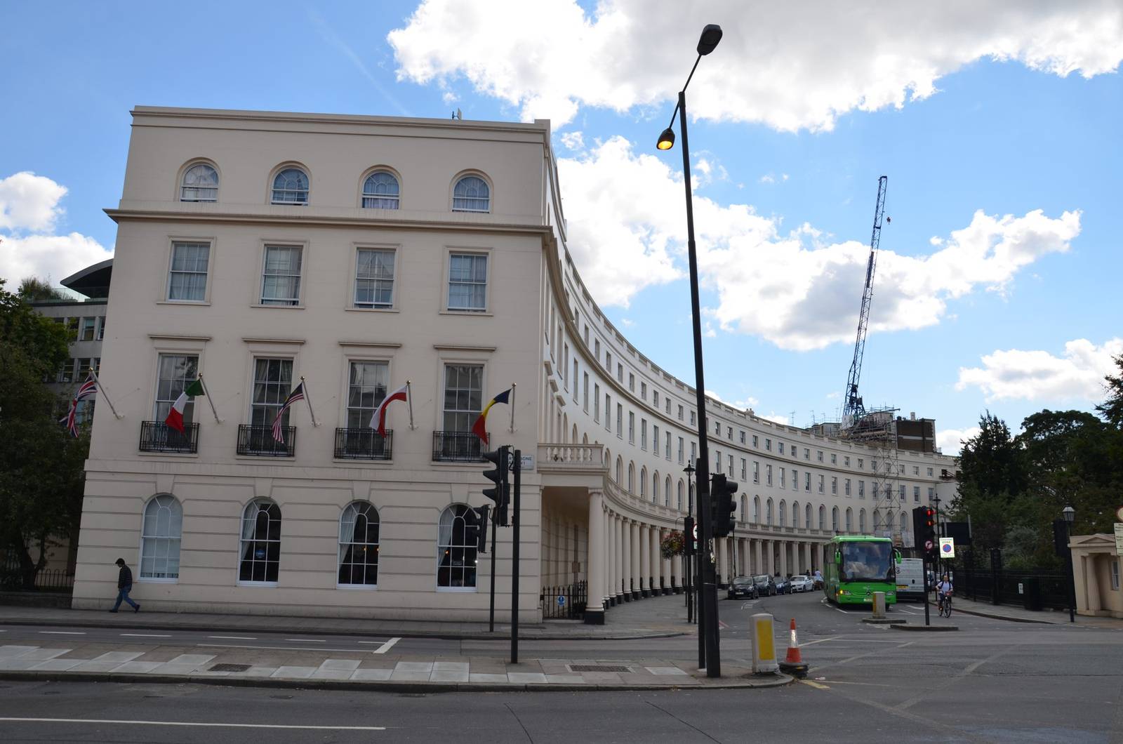A curved terrace of white stucco houses in central London